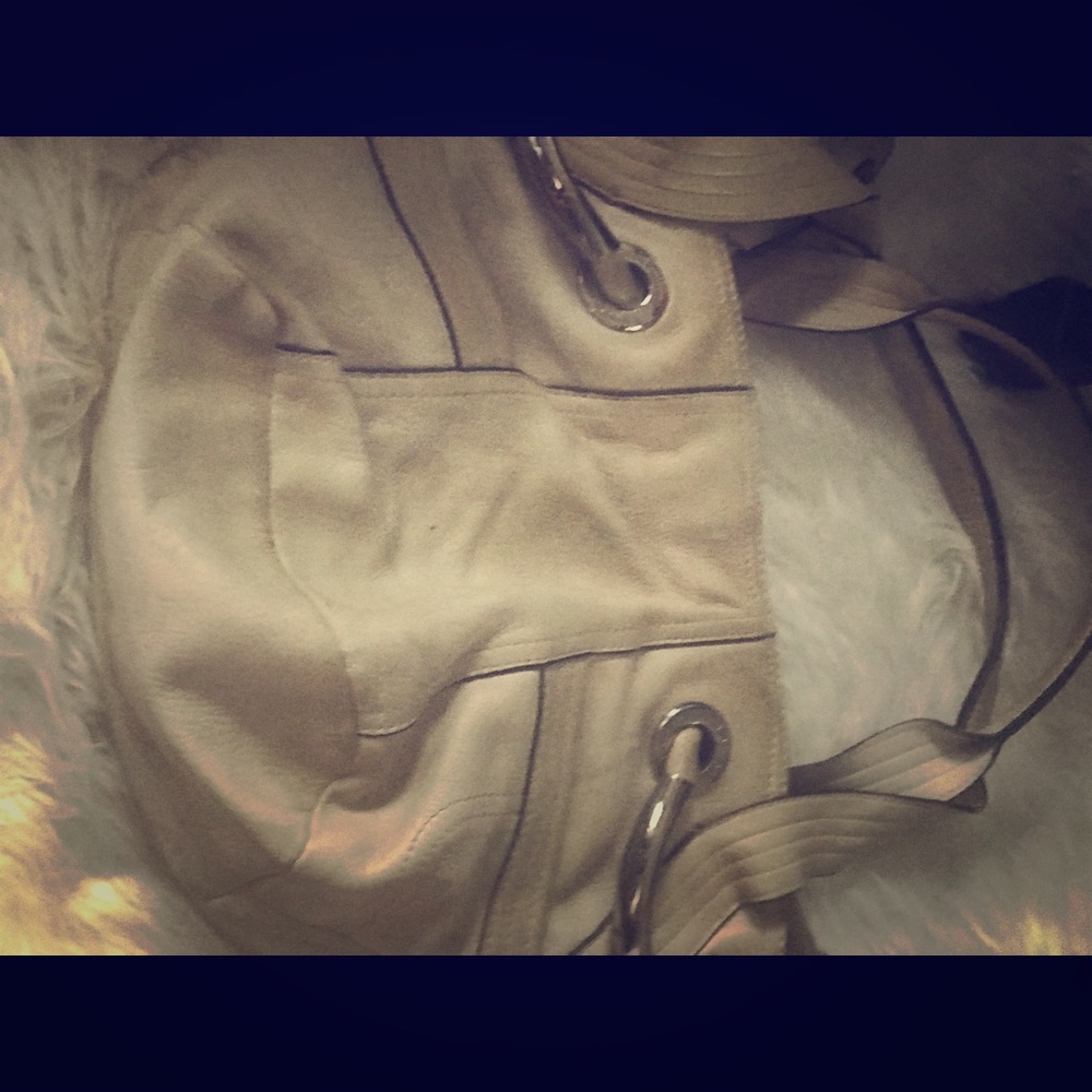 B Markowsy as is purse.